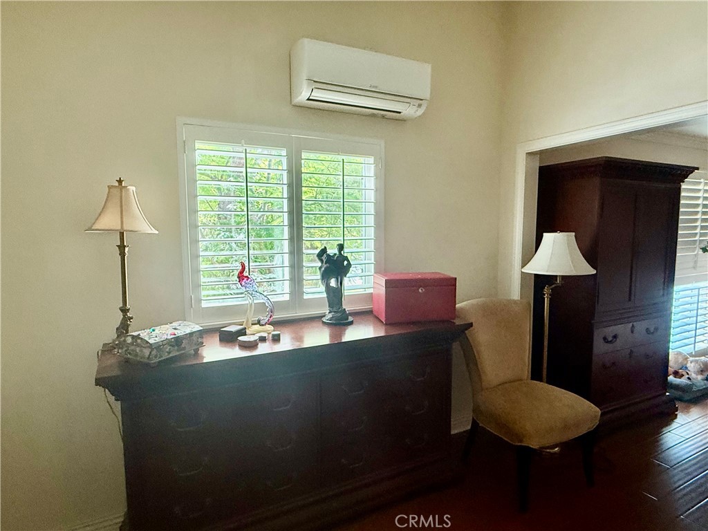 199 Avenida Majorca, Unit C Laguna Woods, CA 92637 - Photo 17 of 30 a dining room with furniture and a window