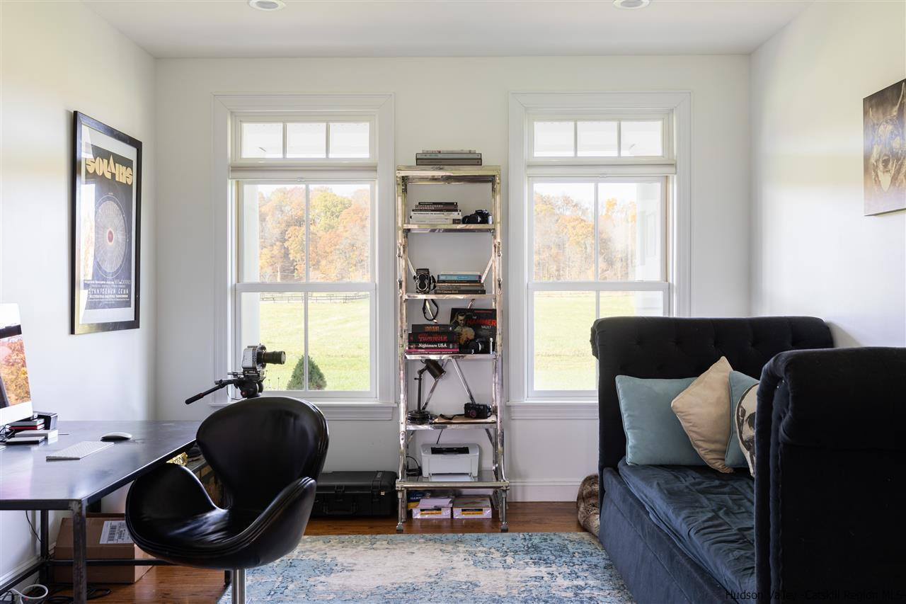 383 Pine Bush Road Stone Ridge, NY 12484 - Photo 18 of 35 a living room with furniture and a window