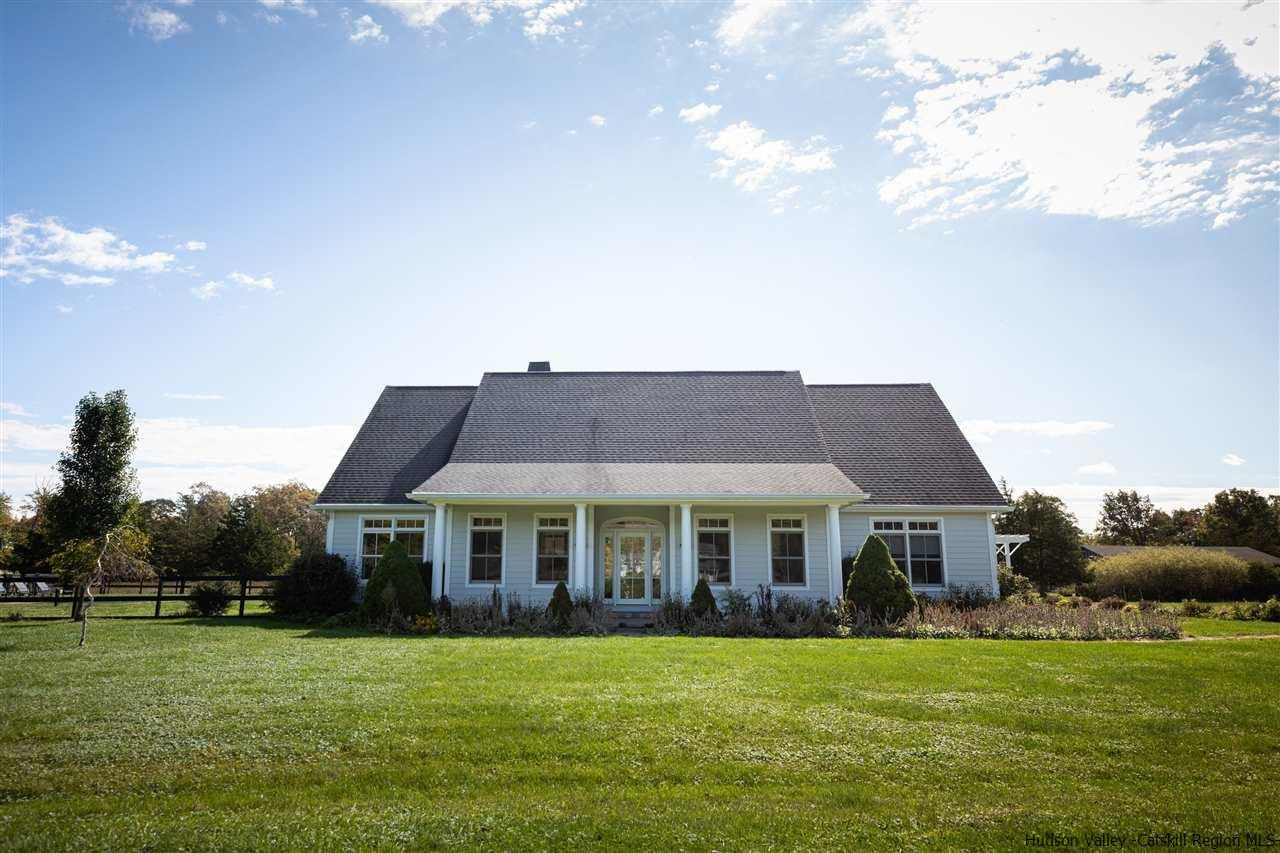383 Pine Bush Road Stone Ridge, NY 12484 - Photo 34 of 35 a front view of a house with a garden