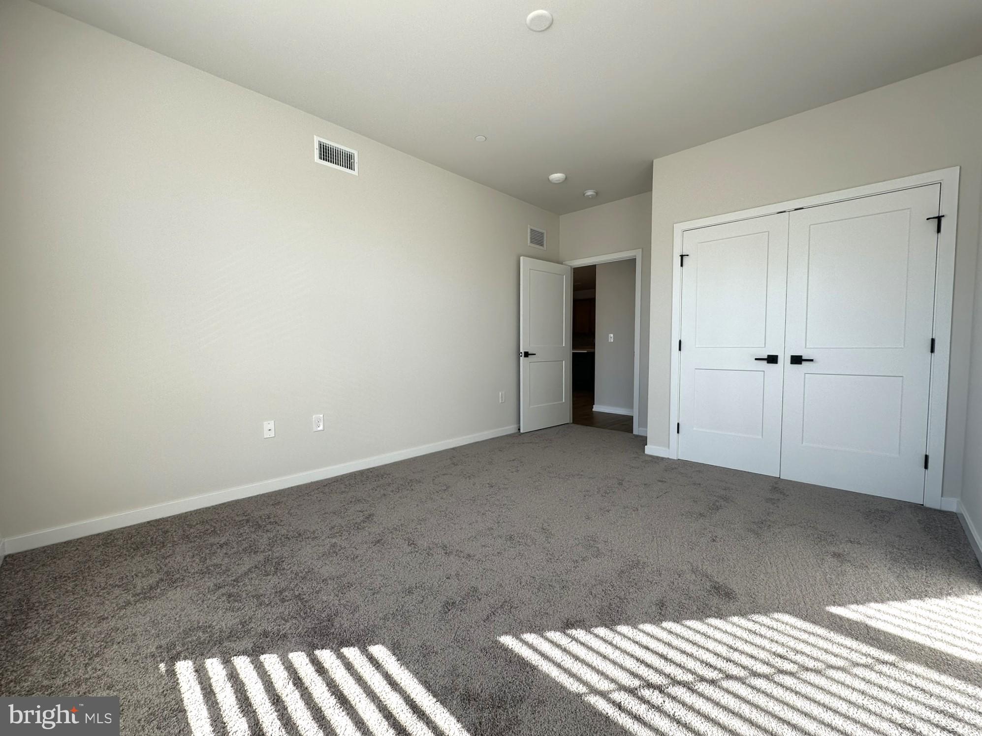 409 West Butler Avenue, Unit 318 Chalfont, PA 18914 - Photo 15 of 32 a view of an empty room