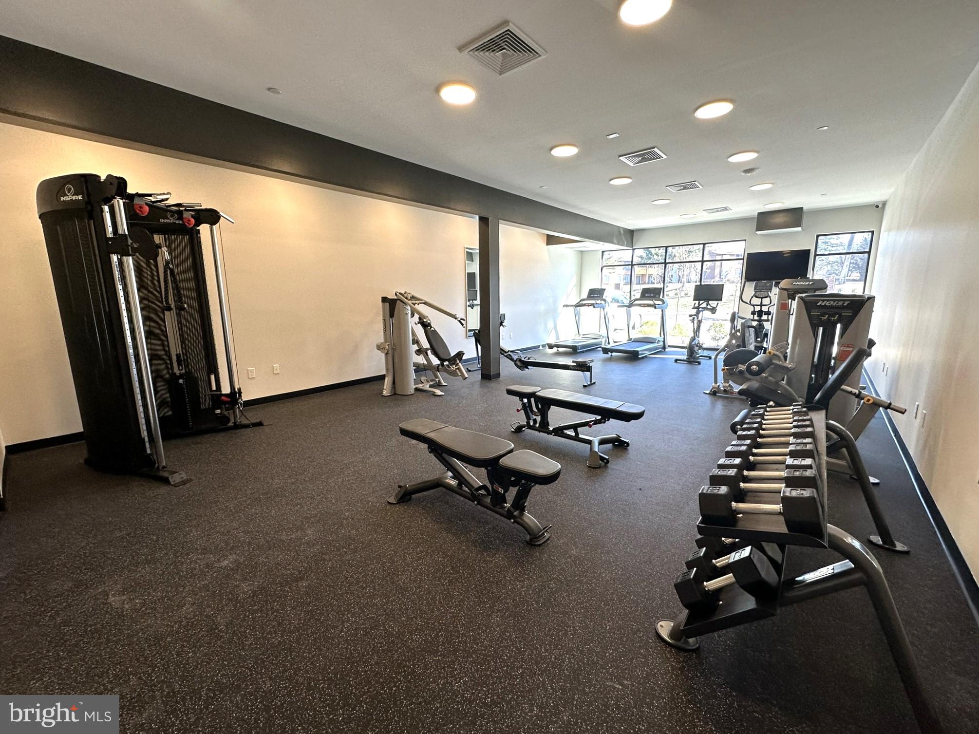 409 West Butler Avenue, Unit 318 Chalfont, PA 18914 - Photo 29 of 32 a view of a room with gym equipment