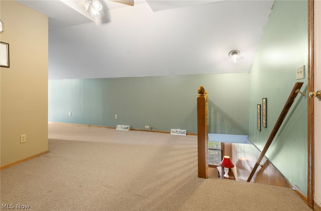 1850 South Sawburg Road Alliance, OH 44601 - Photo 21 of 39 Additional loft living space on second floor featuring ceiling fan/light, light carpet