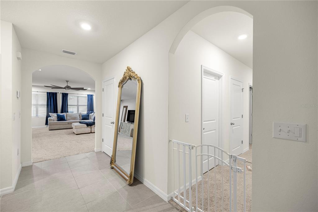 3833 Southeast 98th Place Belleview, FL 34420 - Photo 11 of 34 a view of a living room and a bathroom