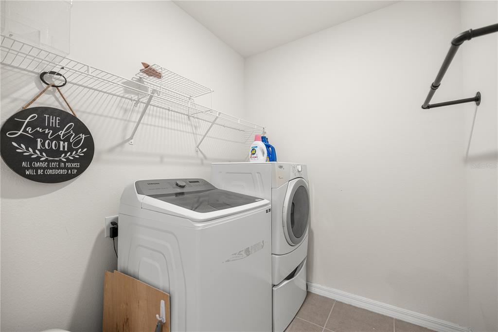 3833 Southeast 98th Place Belleview, FL 34420 - Photo 27 of 34 a utility room with dryer and washer