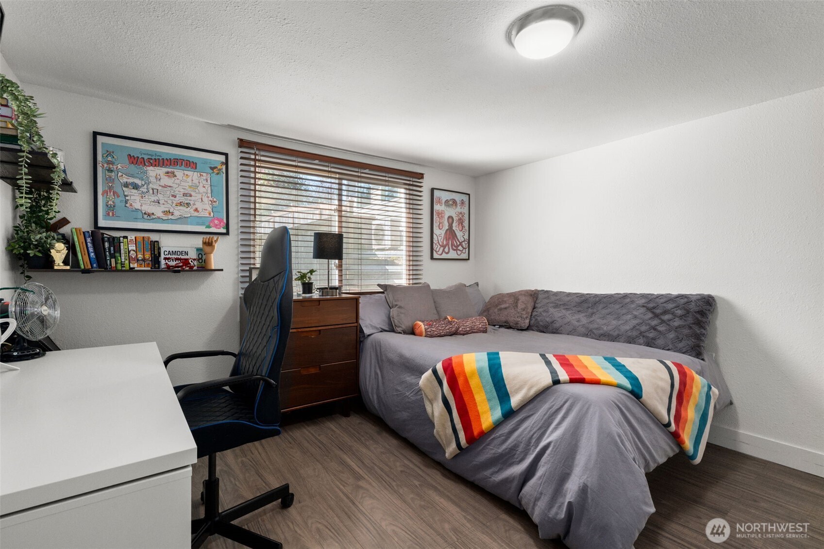 2827 Alder Street Bremerton, WA 98310 - Photo 19 of 35 a bedroom with a bed and wooden floor