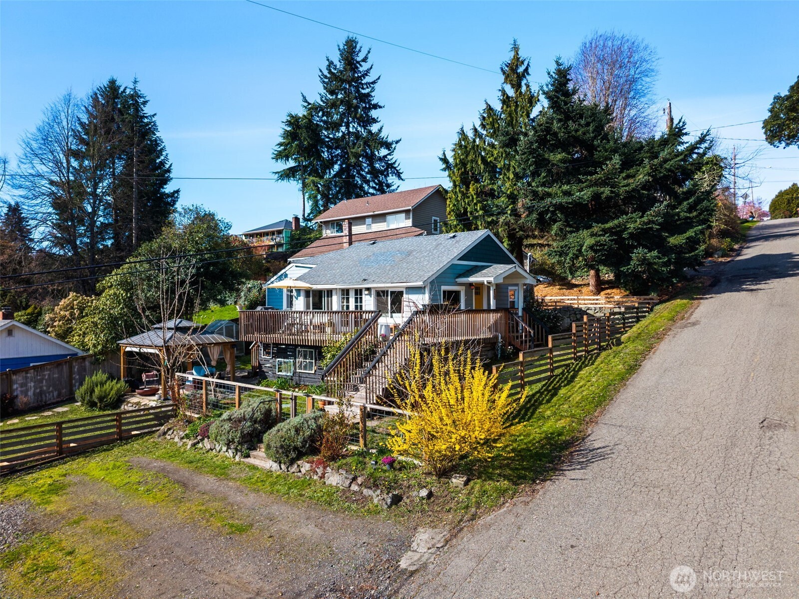 2827 Alder Street Bremerton, WA 98310 - Photo 26 of 35 a aerial view of a house with swimming pool next to a yard