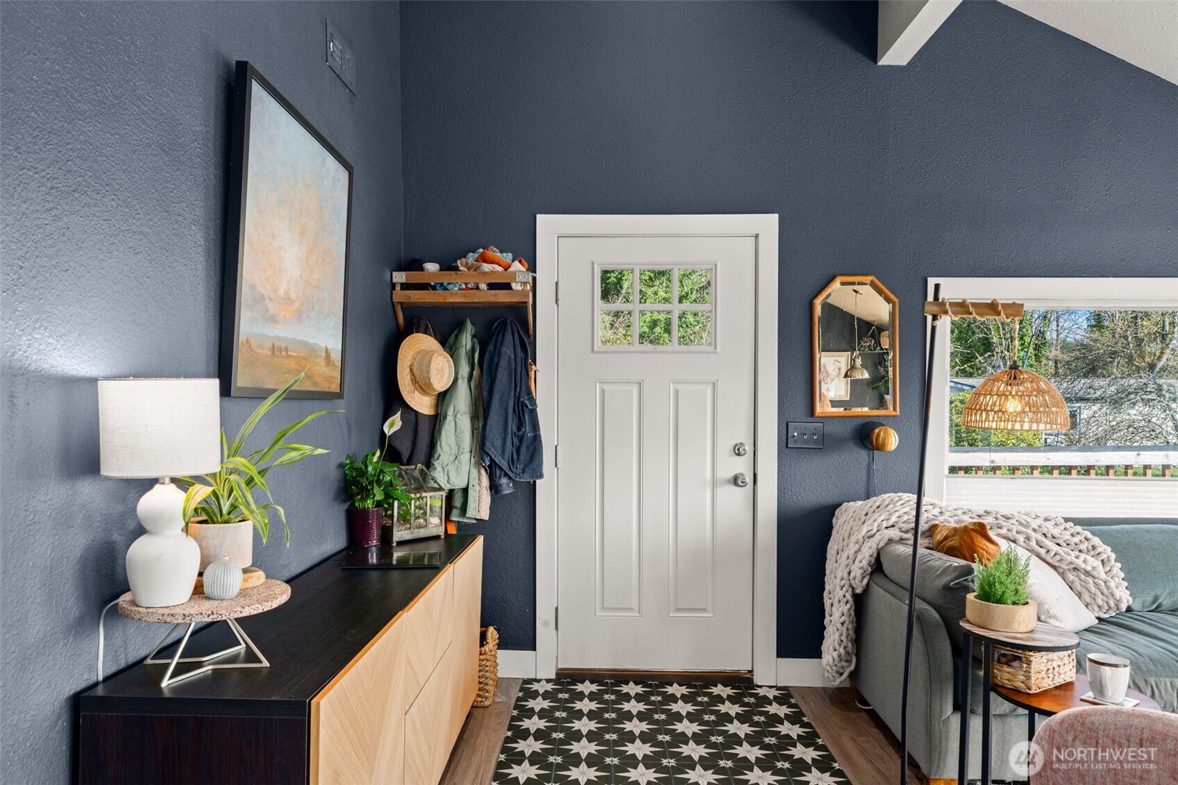 2827 Alder Street Bremerton, WA 98310 - Photo 3 of 35 a room with painting on the wall and a potted plant