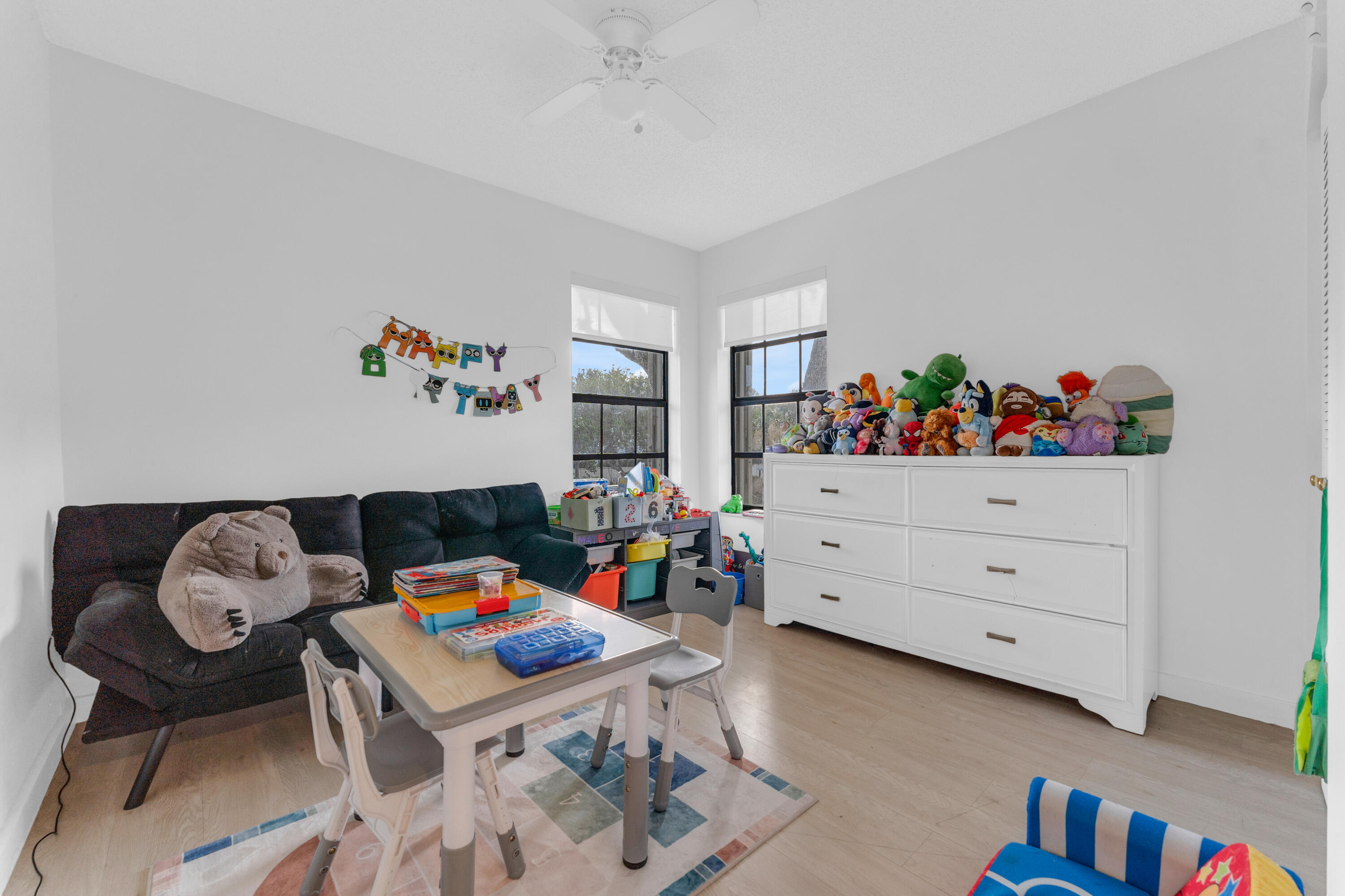 2800 Palmwood Terrace, Unit 2190 Boca Raton, FL 33431 - Photo 14 of 42 a room with furniture and toys