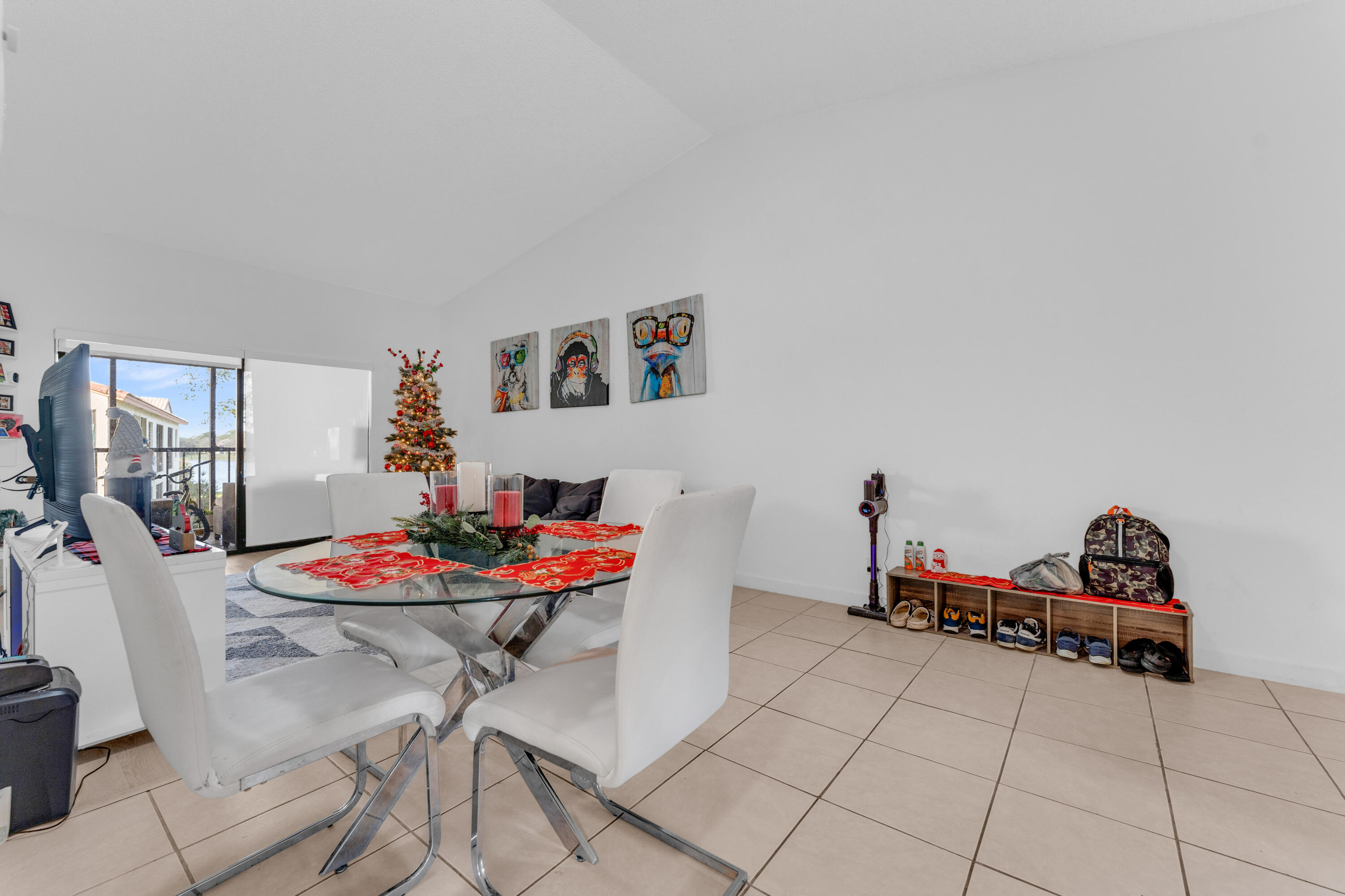 2800 Palmwood Terrace, Unit 2190 Boca Raton, FL 33431 - Photo 21 of 42 a living room with furniture and a table