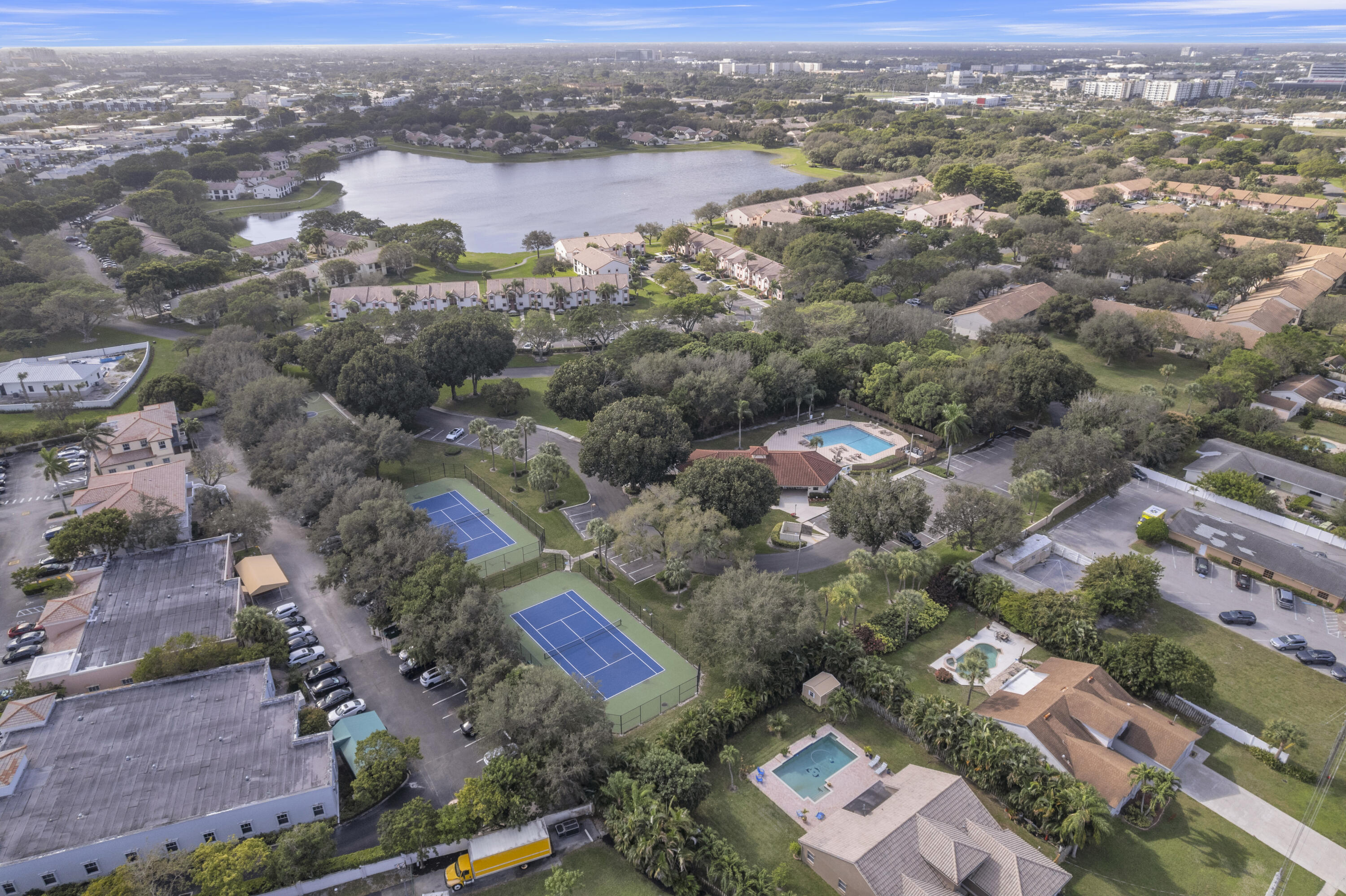 2800 Palmwood Terrace, Unit 2190 Boca Raton, FL 33431 - Photo 36 of 42 an aerial view of a city with lots of residential buildings
