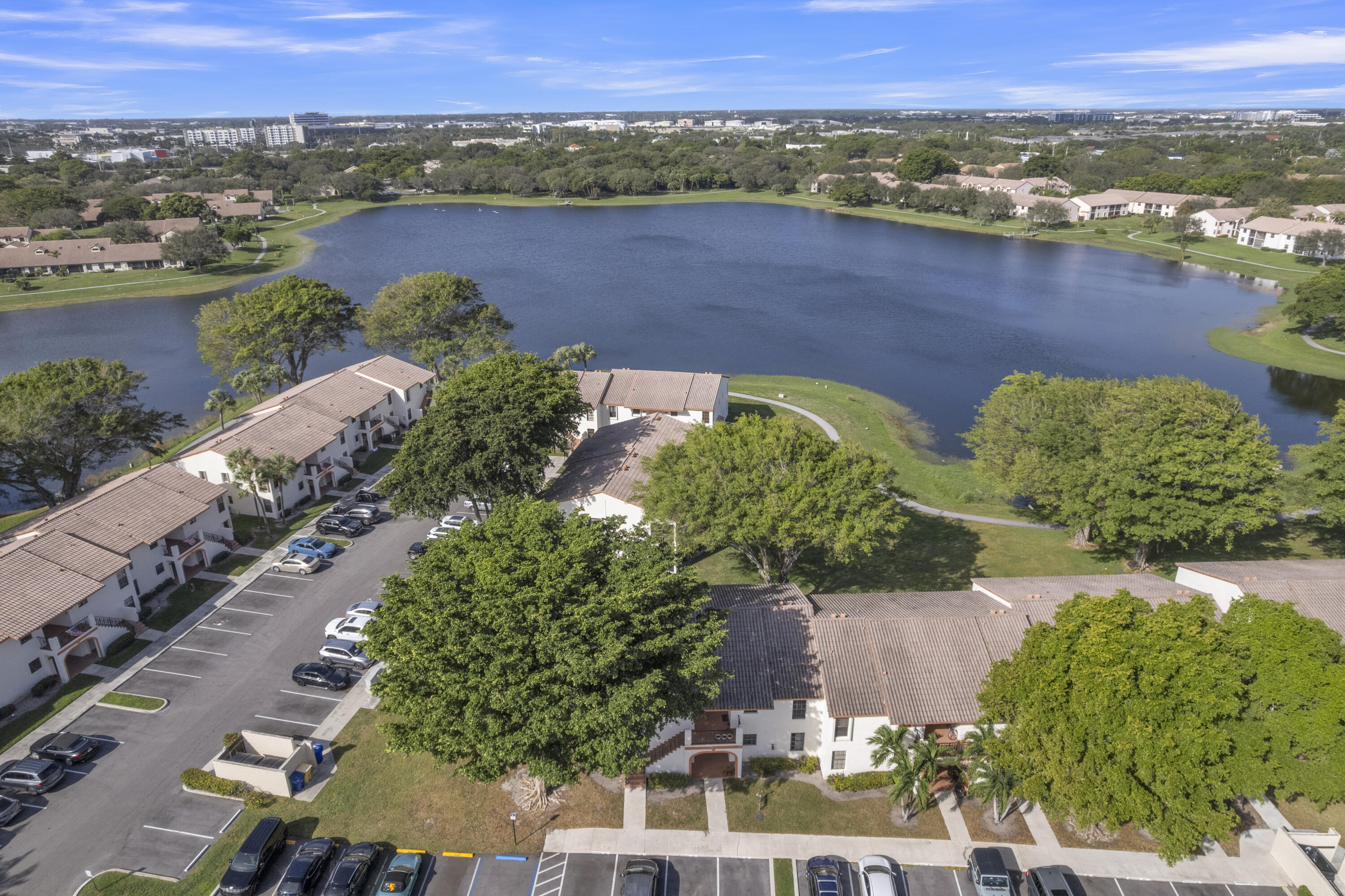 2800 Palmwood Terrace, Unit 2190 Boca Raton, FL 33431 - Photo 38 of 42 an aerial view of a house with a lake view