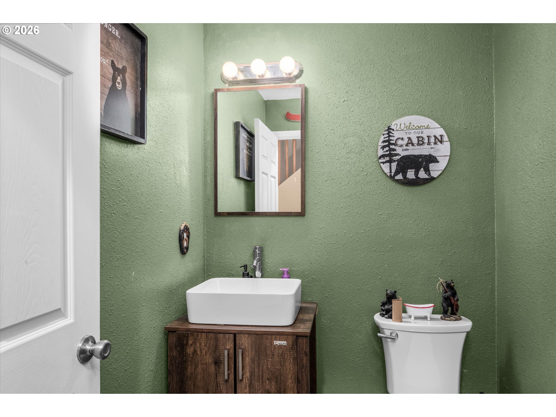 91051 Leashore Drive Vida, OR 97488 - Photo 25 of 36 a bathroom with a sink and a mirror