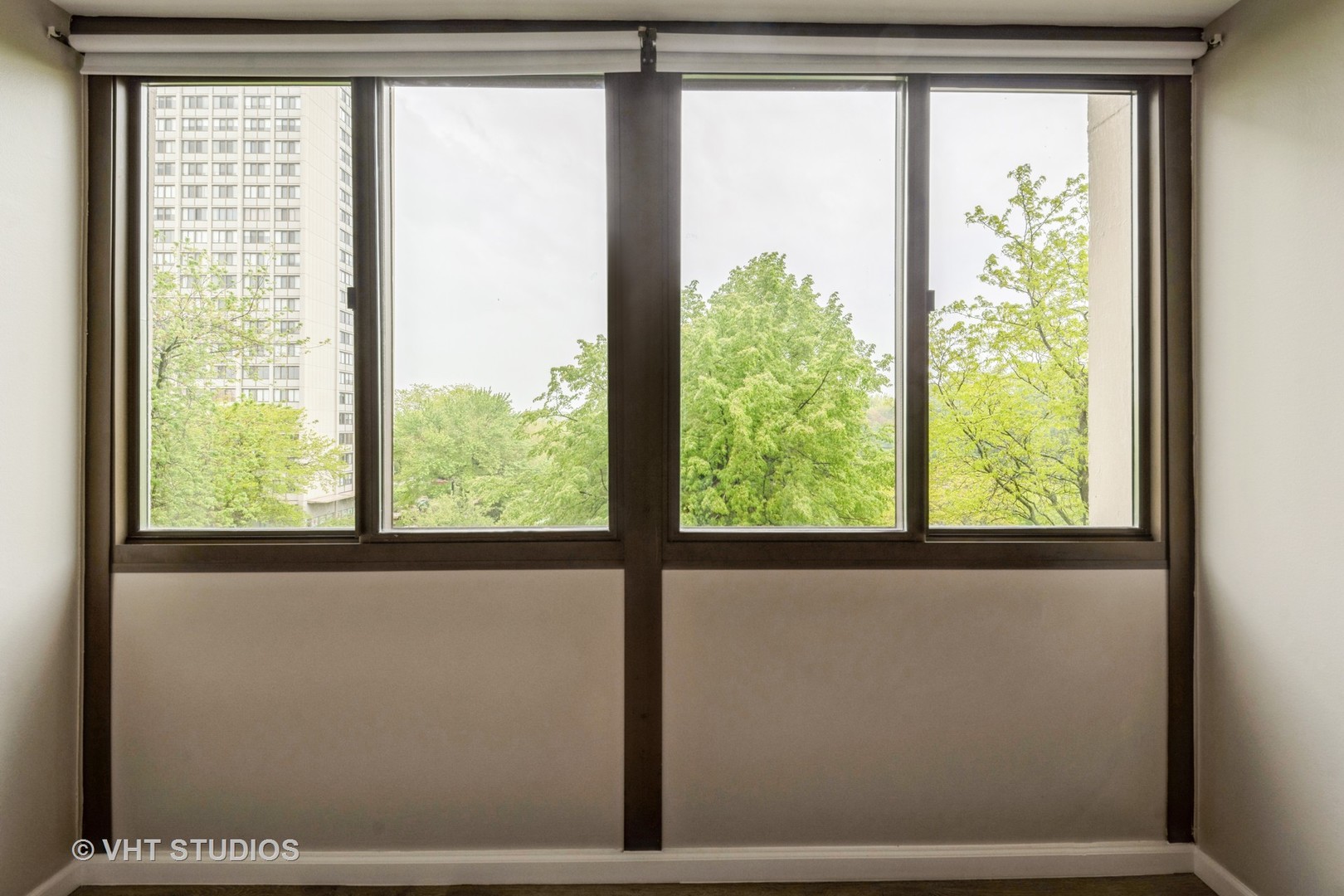 4850 South Lake Park Avenue, Unit 512 Chicago, IL 60615 - Photo 3 of 18 a view of a room that has a window in it