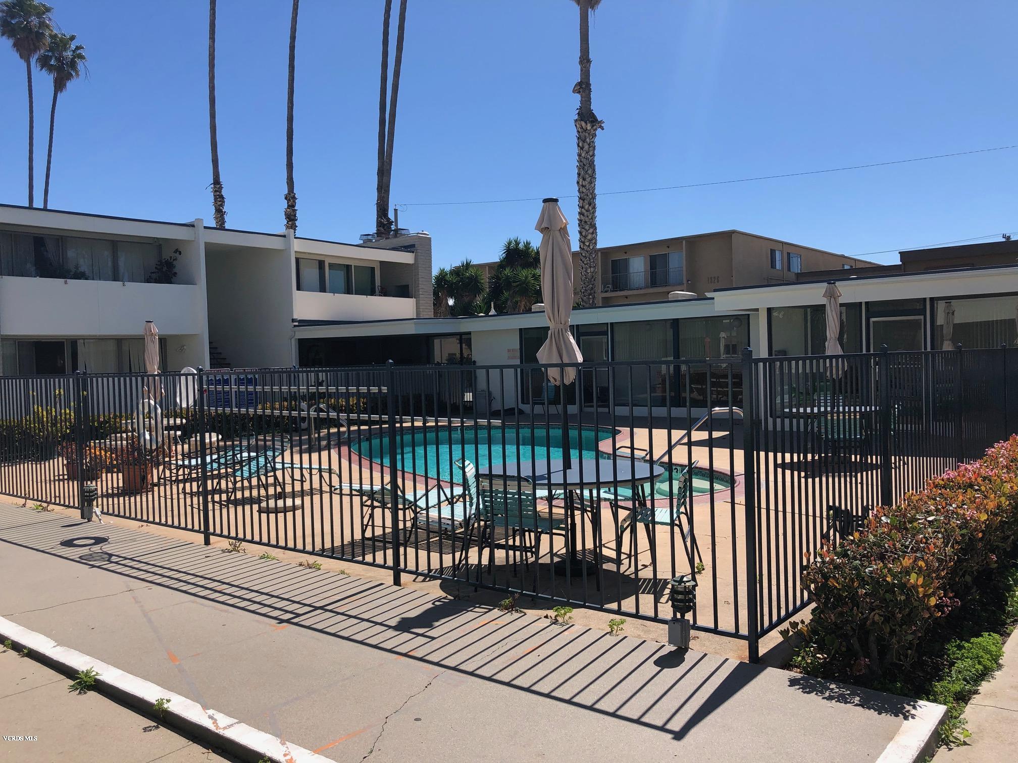 1367 Edgewood Way, Unit 67 Oxnard, CA 93030 - Photo 1 of 13 a view of a building from a balcony