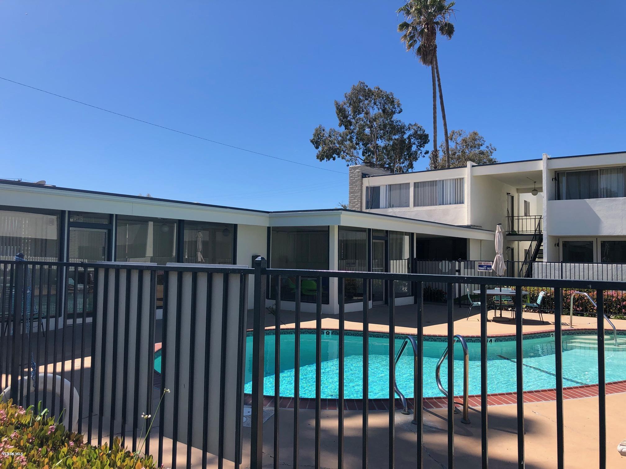 1367 Edgewood Way, Unit 67 Oxnard, CA 93030 - Photo 4 of 13 a view of a balcony with a potted plant