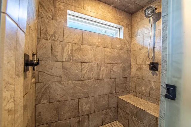 a view of cabinets and wooden floor