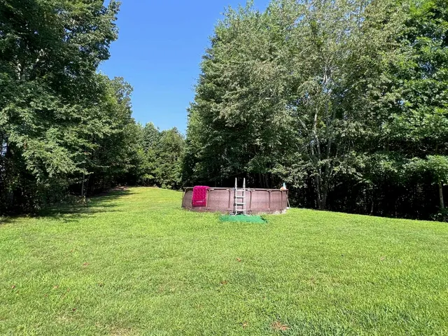 a view of a lake with a mountain in the background