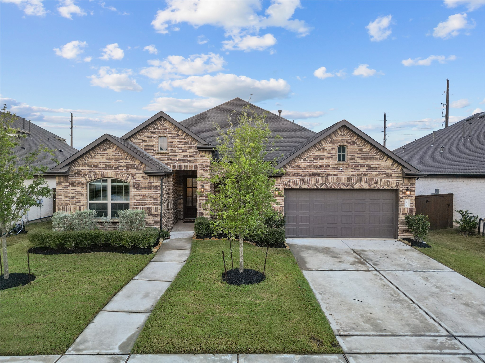 5814 Lavaca Lane Manvel, TX 77578 - Photo 1 of 37 a front view of a house with yard