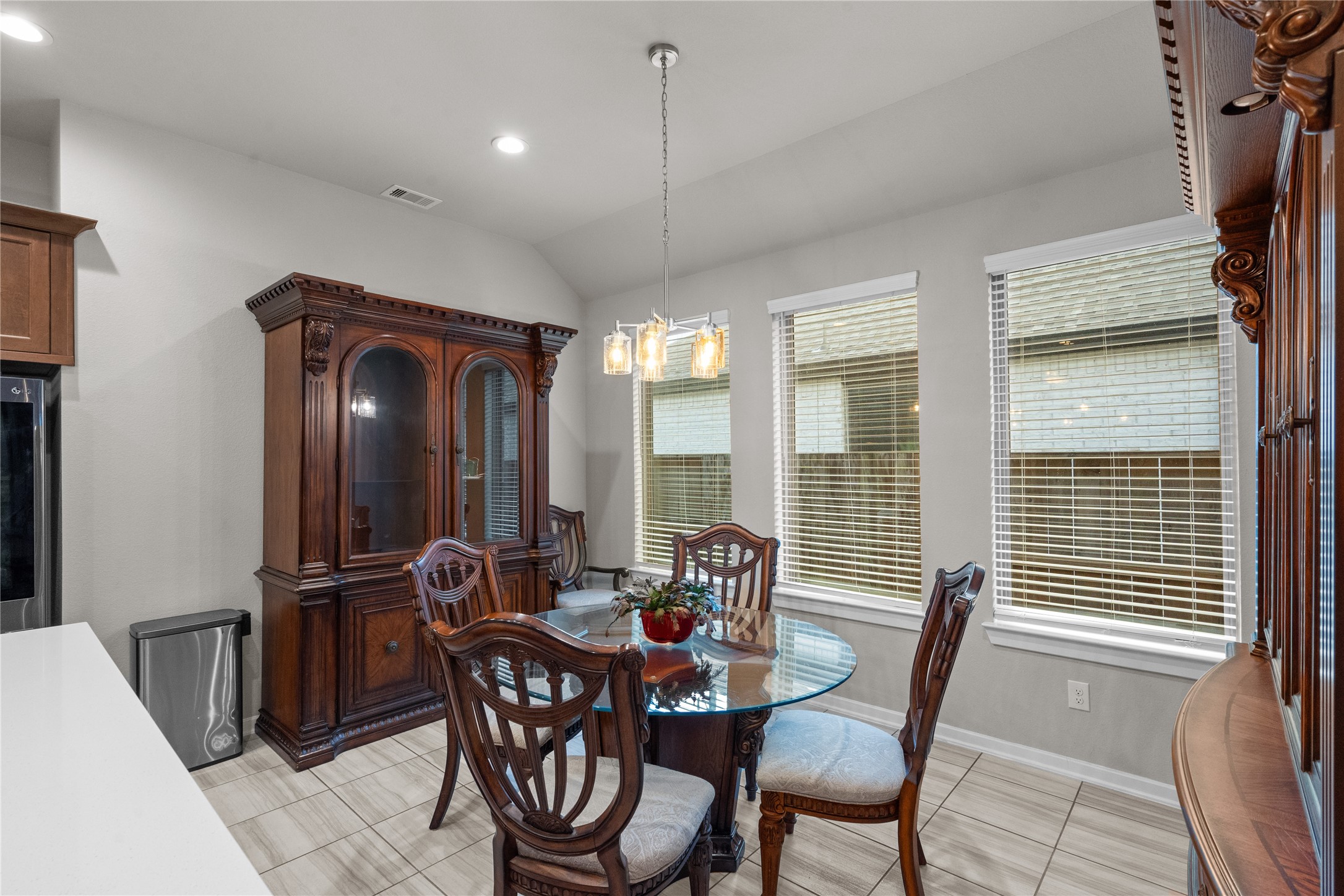 5814 Lavaca Lane Manvel, TX 77578 - Photo 15 of 37 a view of a dining room with furniture window and wooden floor