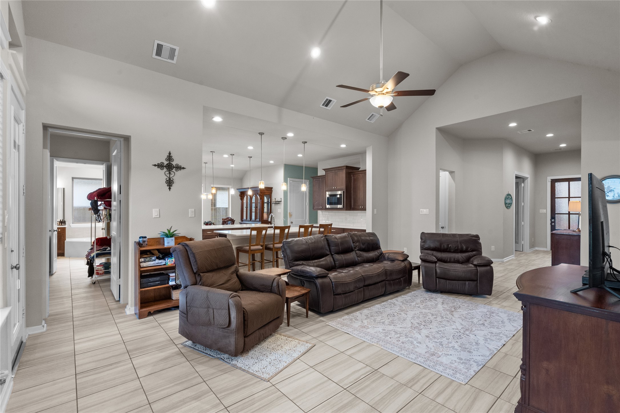 5814 Lavaca Lane Manvel, TX 77578 - Photo 18 of 37 a living room with furniture and a chandelier