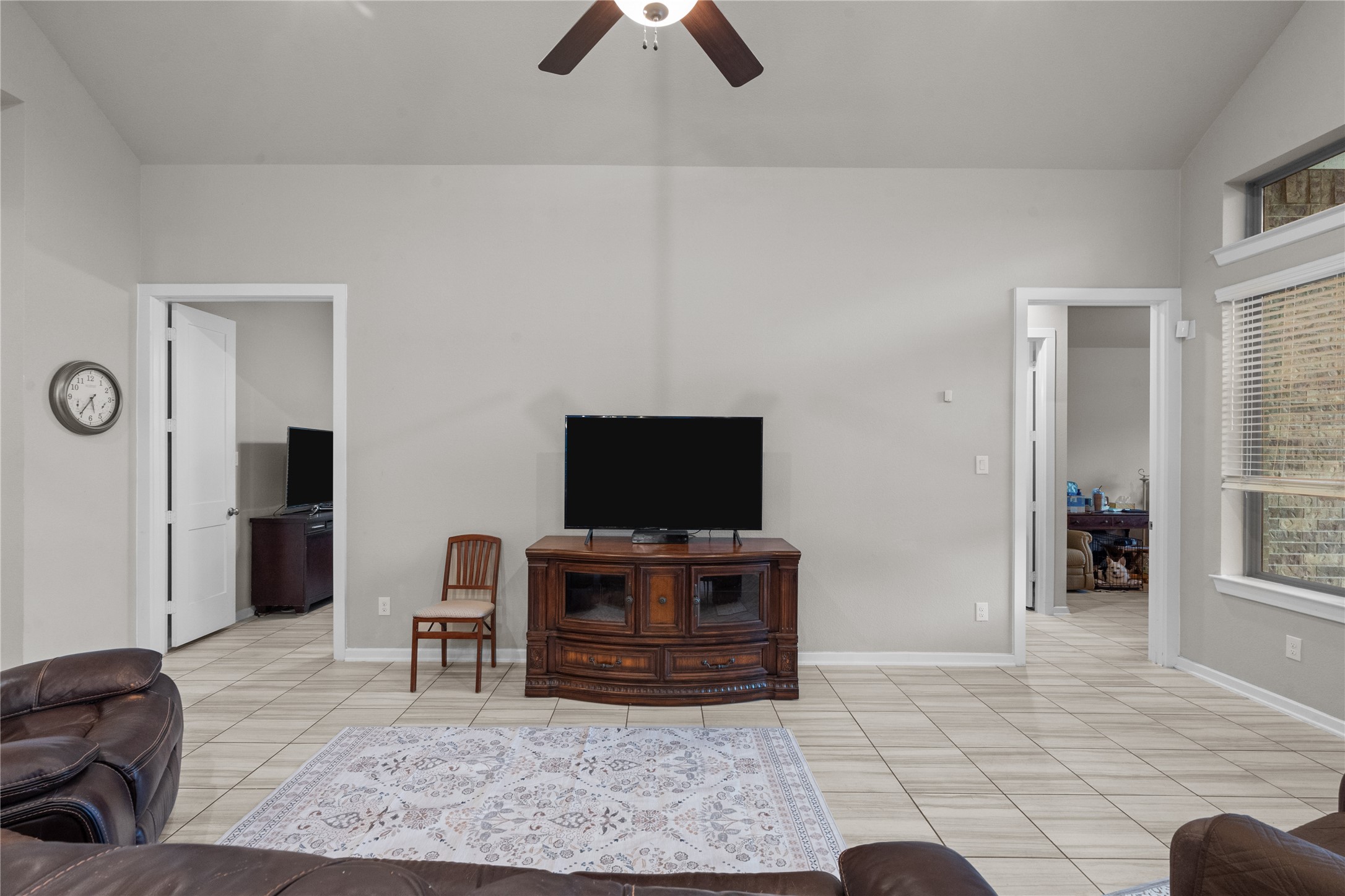 5814 Lavaca Lane Manvel, TX 77578 - Photo 20 of 37 a living room with furniture and a flat screen tv