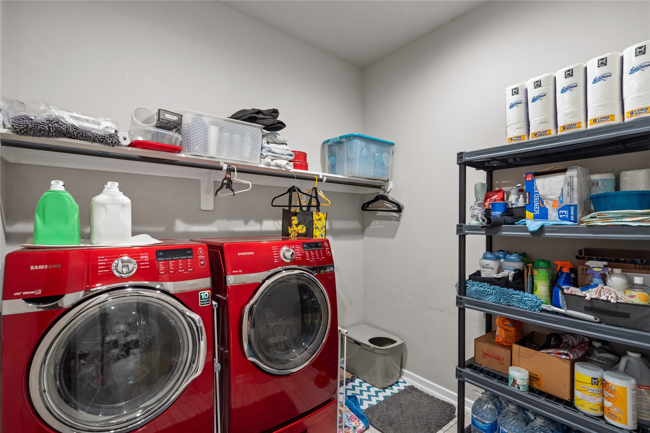 5814 Lavaca Lane Manvel, TX 77578 - Photo 25 of 37 a utility room with dryer and washer