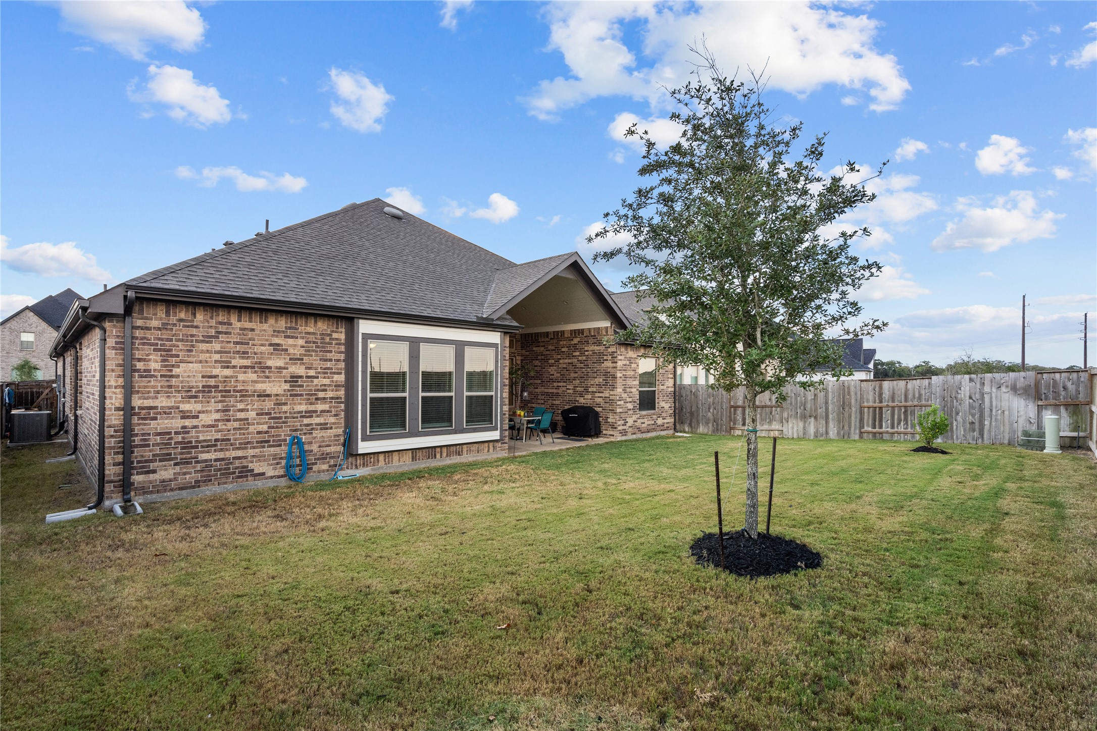 5814 Lavaca Lane Manvel, TX 77578 - Photo 37 of 37 a house with swimming pool in front of it