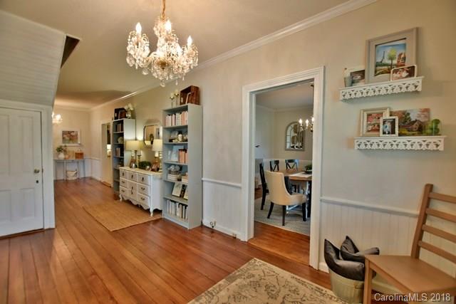 3225 Harmony Road Catawba, SC 29704 - Photo 2 of 27 a living room with furniture and a chandelier