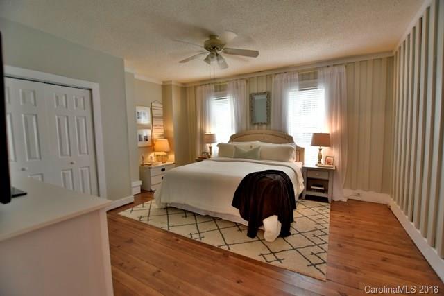 3225 Harmony Road Catawba, SC 29704 - Photo 11 of 27 a bedroom with furniture and wooden floor