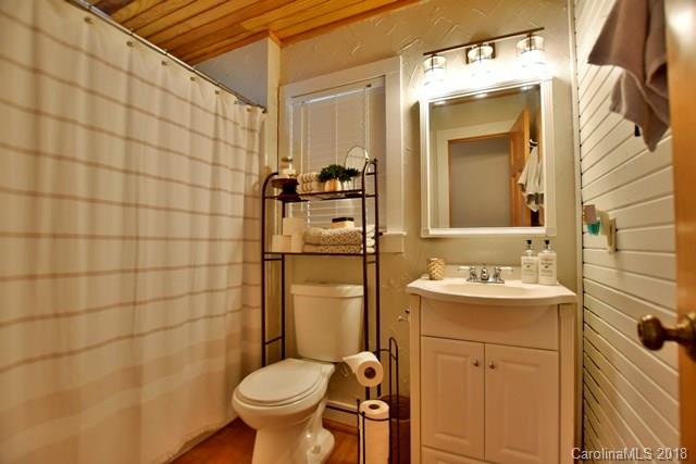 3225 Harmony Road Catawba, SC 29704 - Photo 12 of 27 a bathroom with a sink toilet and shower