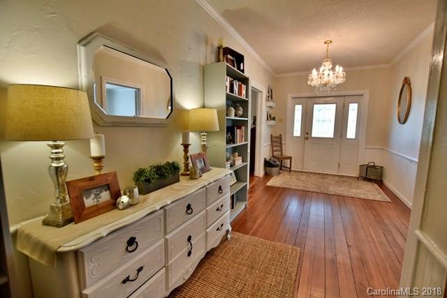 3225 Harmony Road Catawba, SC 29704 - Photo 3 of 27 a kitchen with wooden floors and a sink