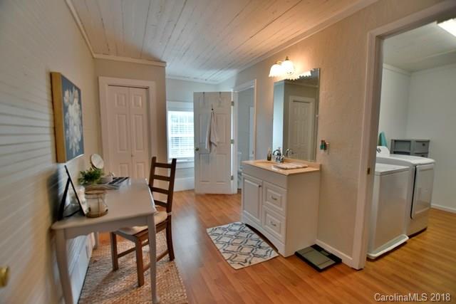 3225 Harmony Road Catawba, SC 29704 - Photo 22 of 27 a room with furniture a rug and a view of bathroom
