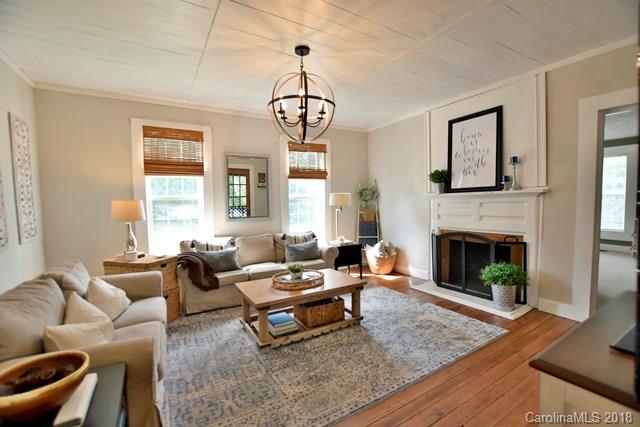 3225 Harmony Road Catawba, SC 29704 - Photo 5 of 27 a living room with furniture fireplace and window