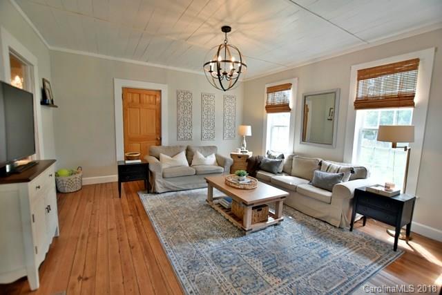 3225 Harmony Road Catawba, SC 29704 - Photo 6 of 27 a living room with furniture a rug and a window