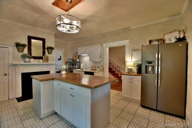 3225 Harmony Road Catawba, SC 29704 - Photo 8 of 27 a kitchen with stainless steel appliances granite countertop a sink and a refrigerator