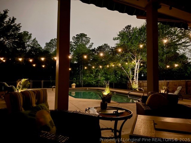 930 Old Vander Road Fayetteville, NC 28312 - Photo 45 of 45 a view of a couches and dinning table in patio with a yard