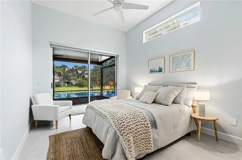 a bed room with a bed and a couch