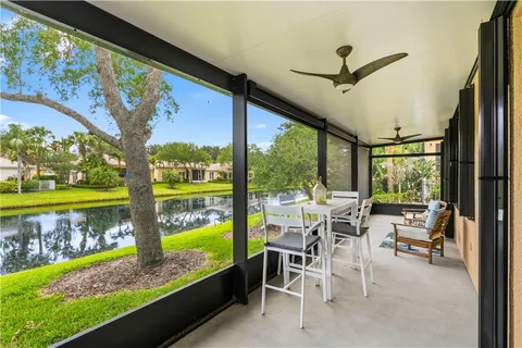 a view of a chairs and table in a patio