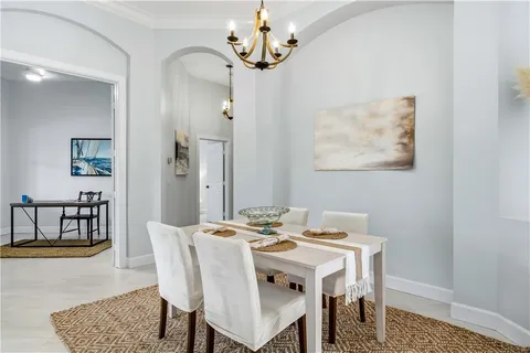 a view of a dining room with furniture