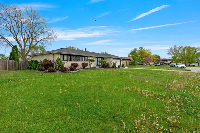 a view of a house with a big yard