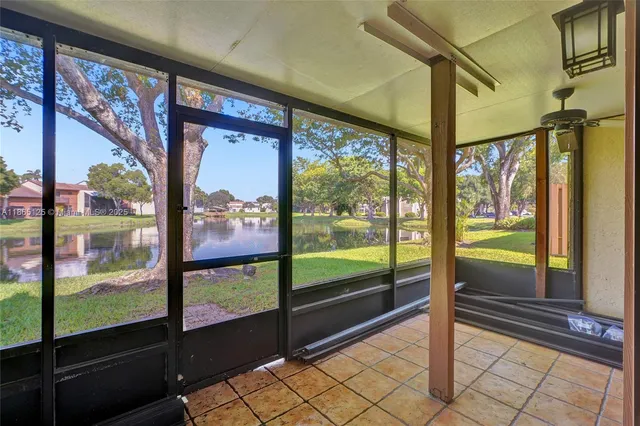 a view of a porch and wooden floor