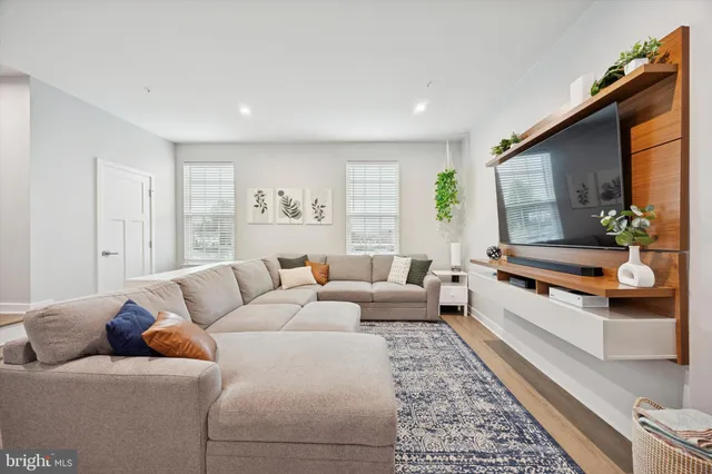 a living room with furniture and a couch