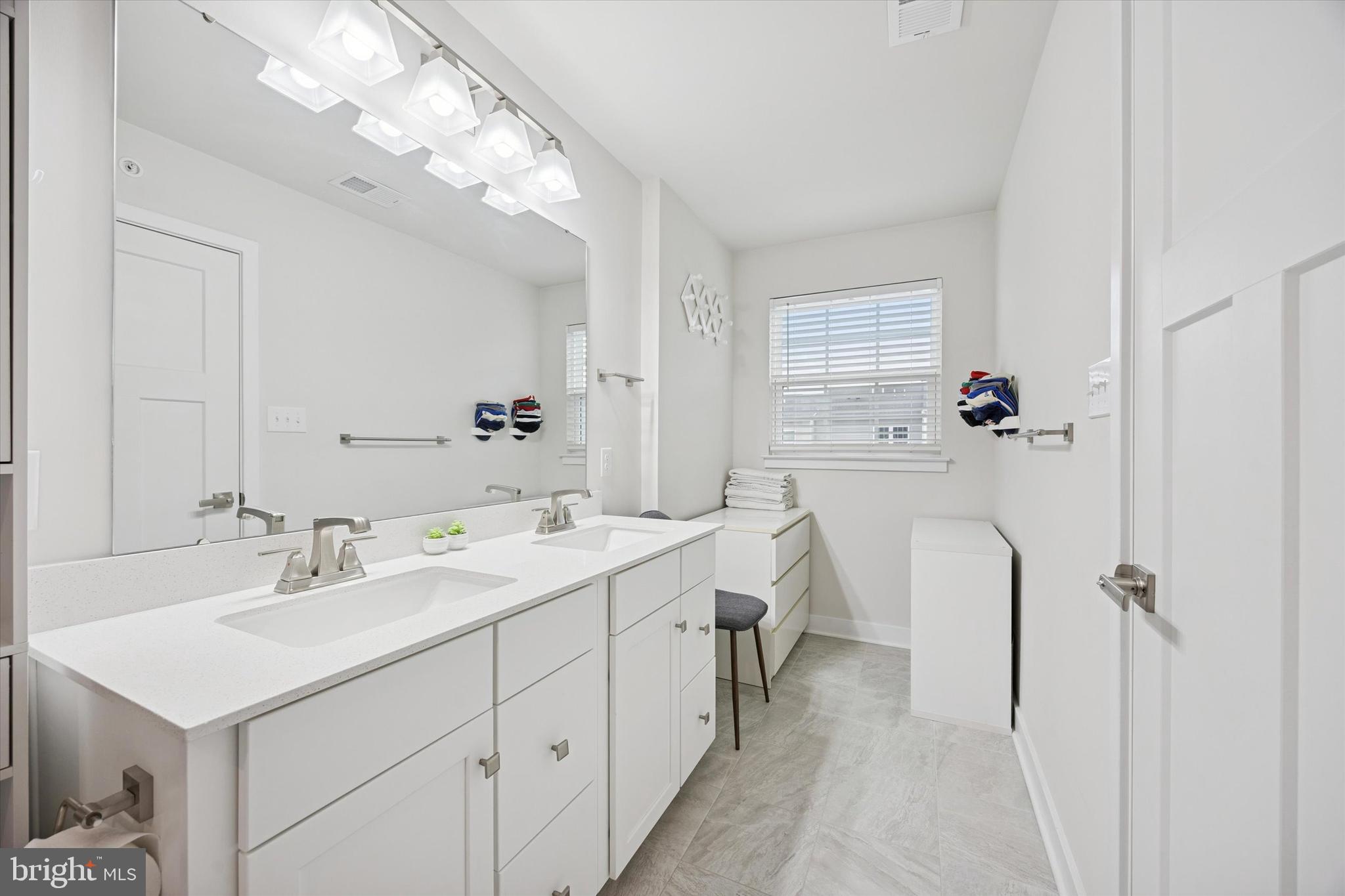 135 Bishop Way Dublin, PA 18917 - Photo 17 of 24 a bathroom with a sink double vanity and a mirror