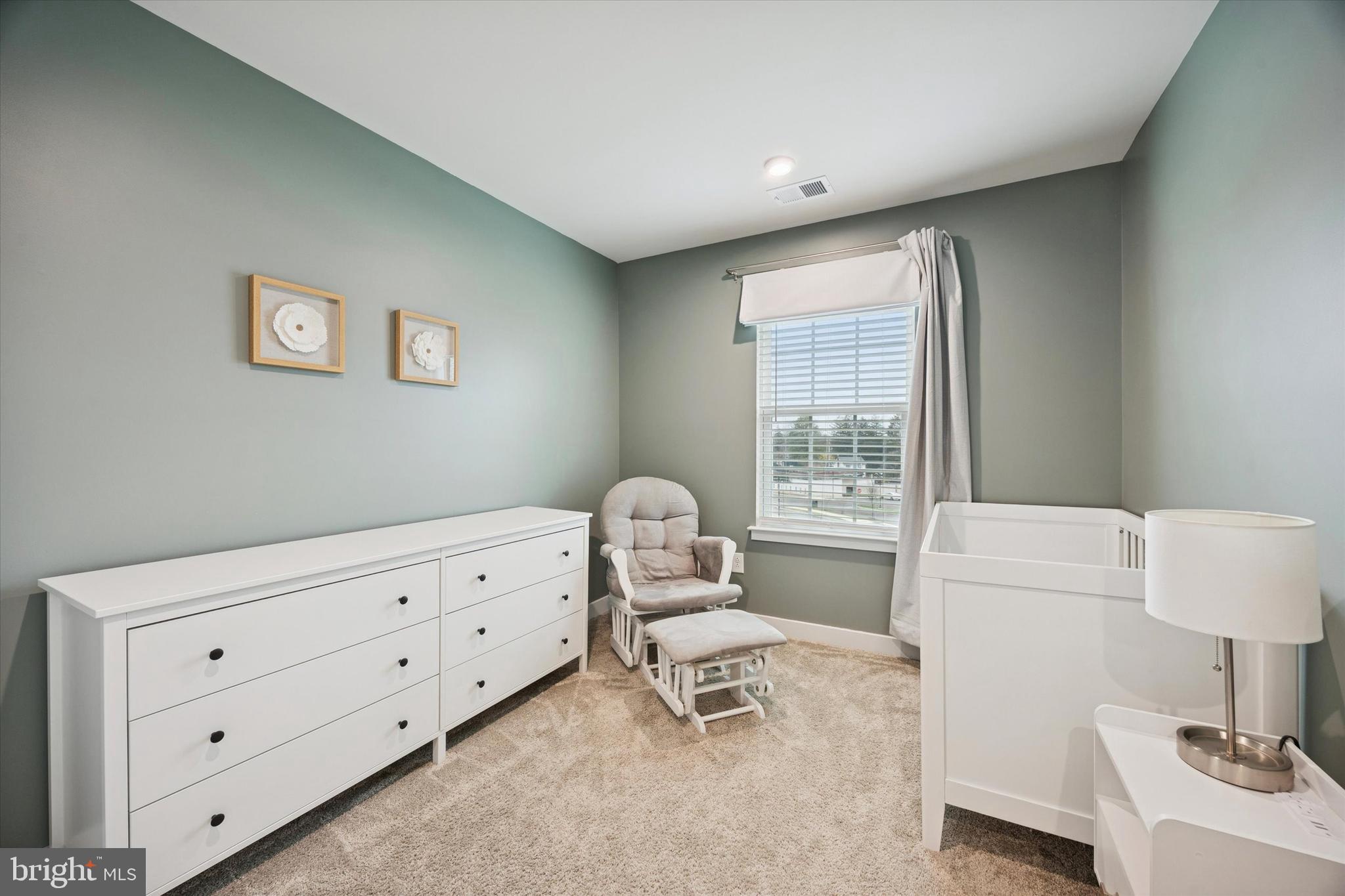 135 Bishop Way Dublin, PA 18917 - Photo 18 of 24 a bedroom with a bed and a table in it