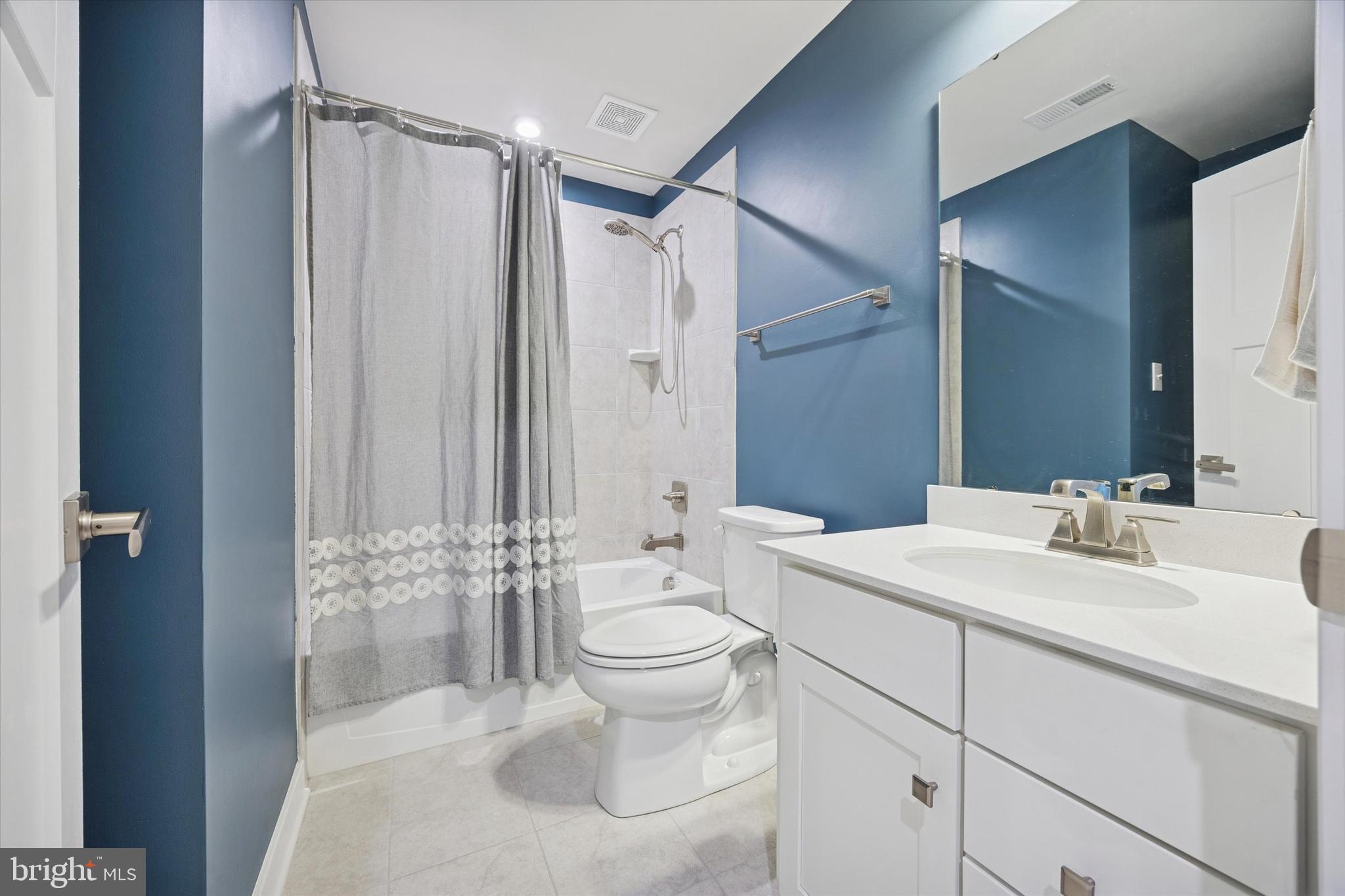 135 Bishop Way Dublin, PA 18917 - Photo 5 of 24 a bathroom with a sink toilet and shower