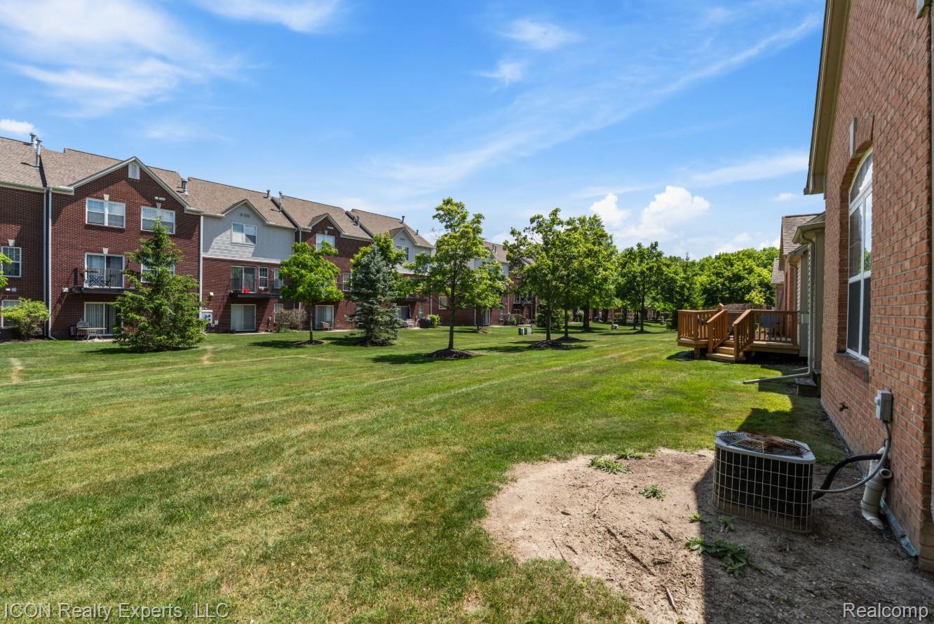531 Cherry Grove Road Canton, MI 48188 - Photo 30 of 30 Expansive green space featuring mature trees and landscaped grounds