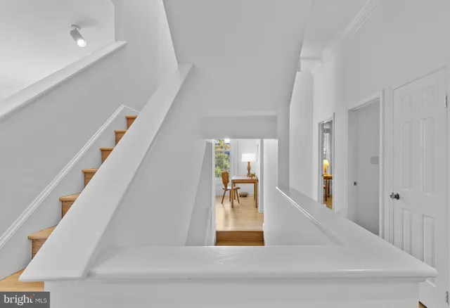 a view of a hallway view with staircase