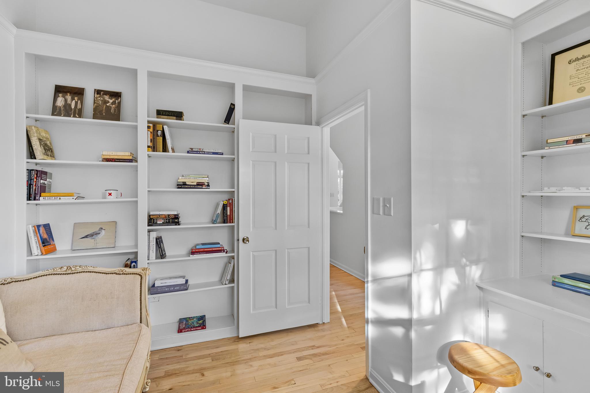 2 Southgate Avenue, Unit 10 Annapolis, MD 21401 - Photo 22 of 41 a room with a book shelf and a shelf