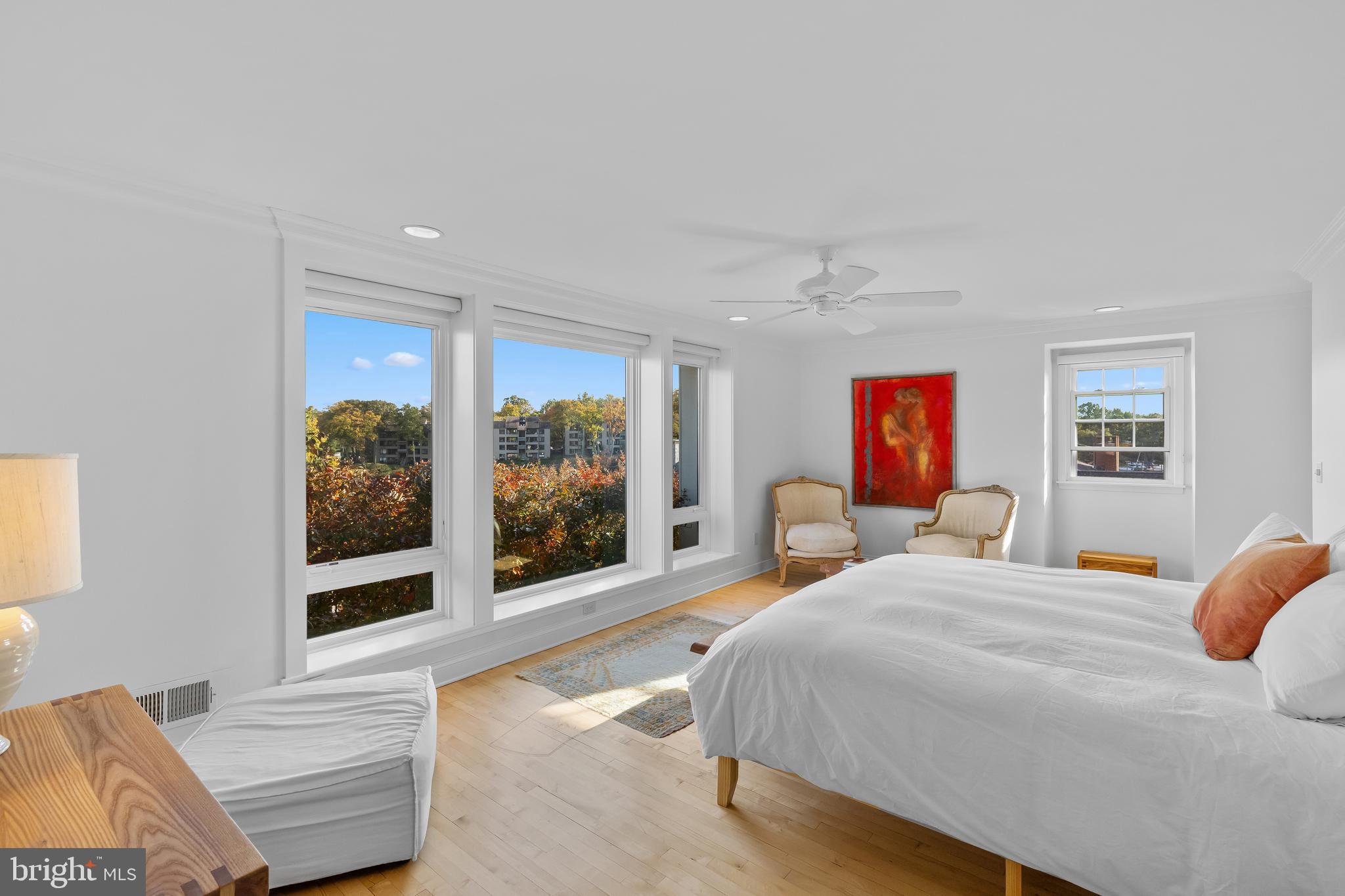 2 Southgate Avenue, Unit 10 Annapolis, MD 21401 - Photo 25 of 41 a bedroom with a balcony a bed and wooden floor