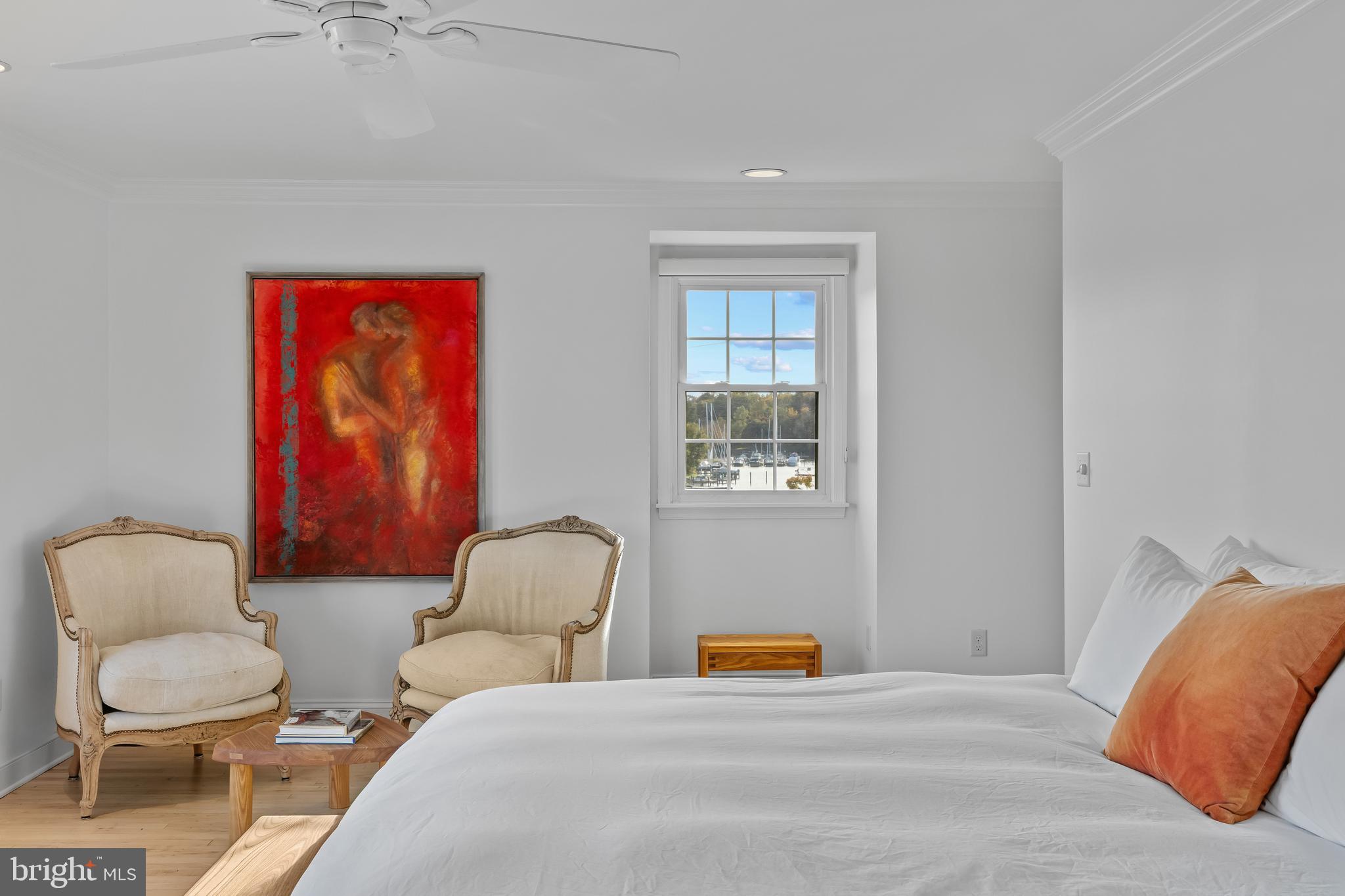 2 Southgate Avenue, Unit 10 Annapolis, MD 21401 - Photo 27 of 41 a bedroom with a bed and a chair